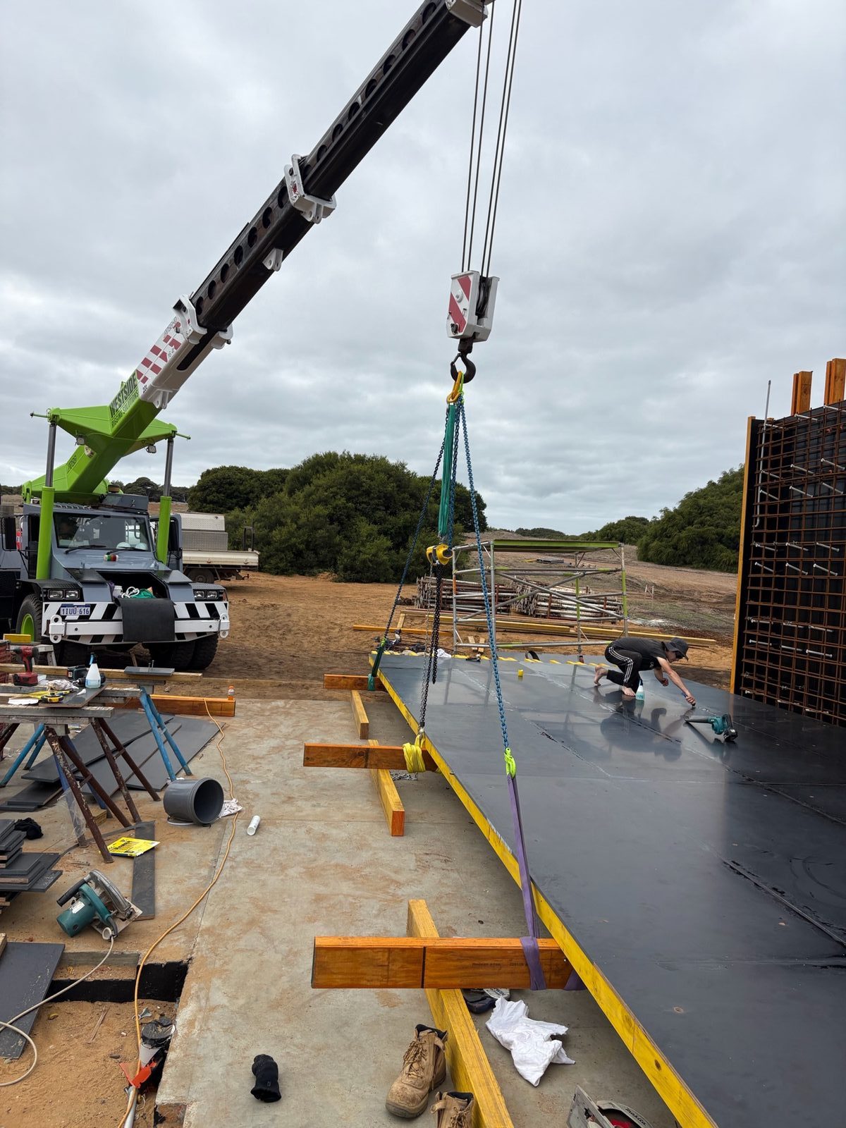 Franna and slewing crane placing 5m by 15m concrete shutters Margaret River